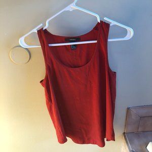 Tank with zipper in back